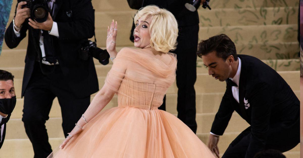 image of The pop star donned a peach tulle Oscar de la Renta gown for the 2021 Met Gala.