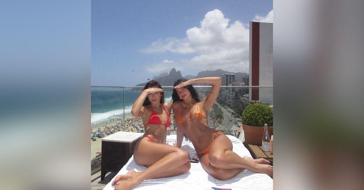 image of Dua Lipa and her sister, Rina, posed in tiny bikinis during their Brazil trip.