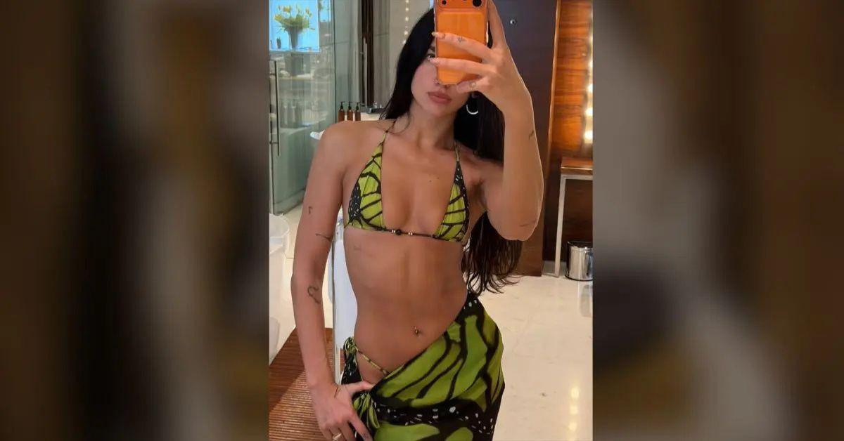 image of Dua Lipa showed off her abs in a bikini on Instagram last month.