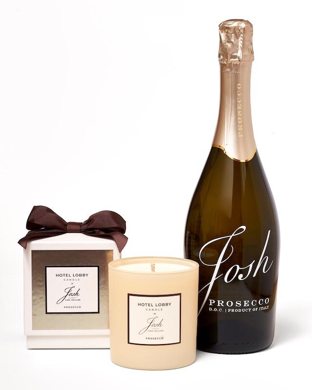 josh cellars x hotel lobby candle prosecco set white background