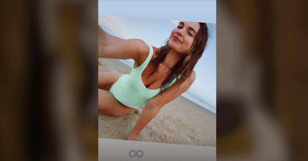 image of The 'Swiped' star looked sun-kissed at the beach.